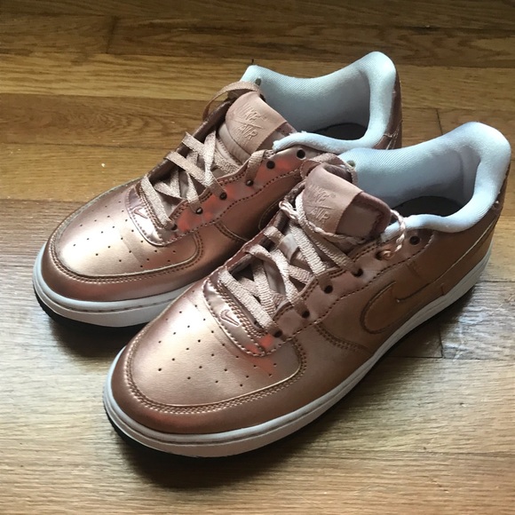 gold nike air force ones
